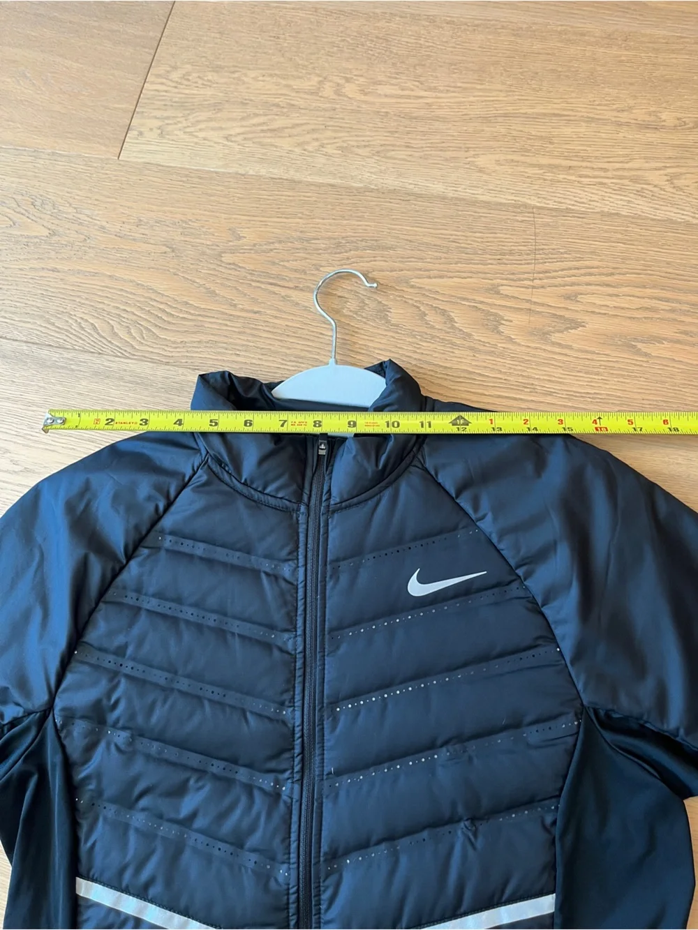Nike Women's Black Puffer Jacket with White Accents